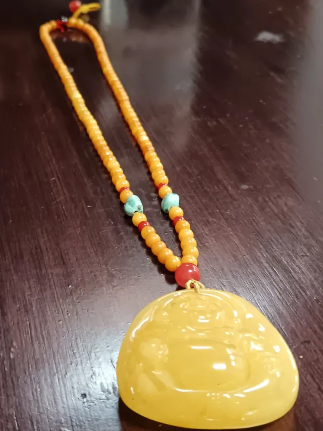 Collana in stile asiatico con pendente di Buddah