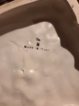 Statuetta ceramica uomo seduto