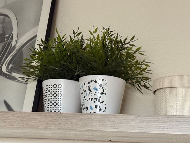 Par de plantas artificiales con maceta