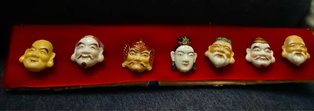 Juego 7 botones caras decorativas