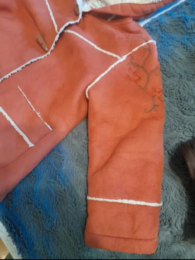 Trenca niña forrada borreguito Zara