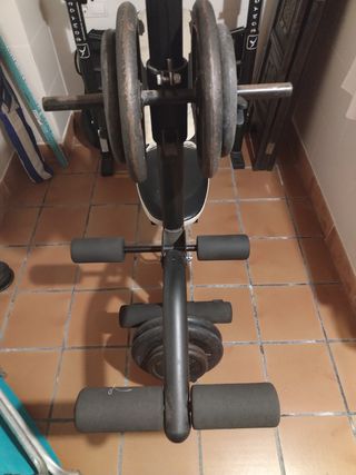 Banco de pesas y discos