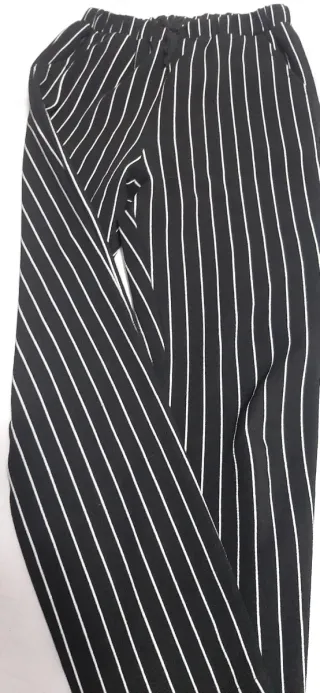Pantaloni neri a righe bianchetaglia 11/12anni