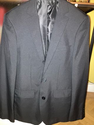 Chaqueta de vestir azul marino.