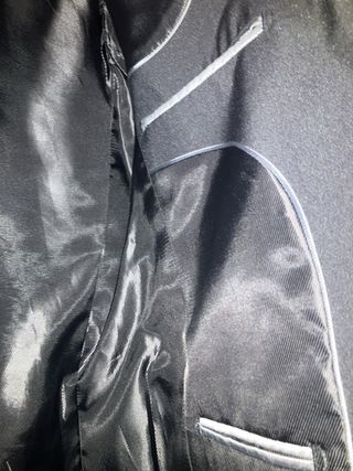 Chaqueta de vestir azul marino.