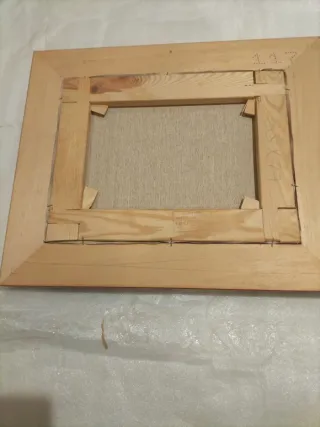 Cuadro naturaleza muerta con limones y cerezas.