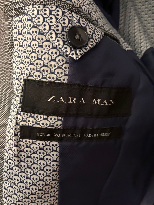 Americana color gris, talla M.