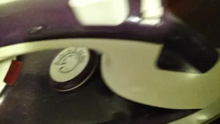 Plancha de ropa morada