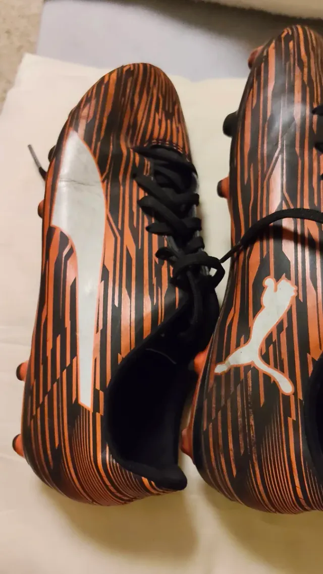 Botas tacos futbol hombre