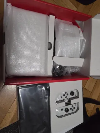 Nintendo Switch OLED Blanca Extras