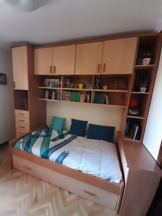 Dormitorio juvenil con cama nido y armario