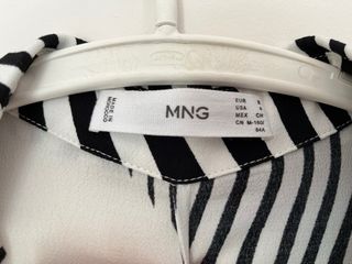 Camisa de rayas blanca y negra