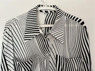 Camisa de rayas blanca y negra