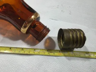 Botella con forma de bombilla.