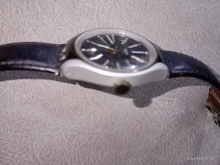 Reloj Swatch Negro y Plateado