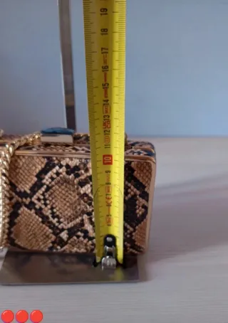 Pochette Mango effetto pitone