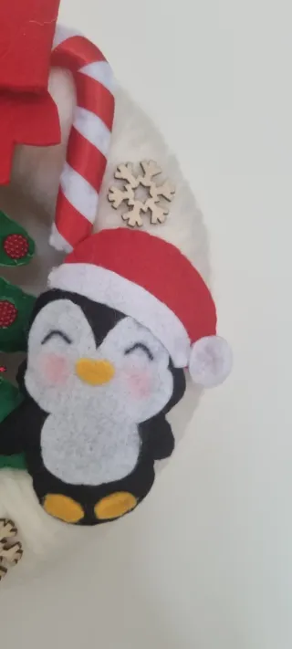 Ghirlanda natalizia con pinguini