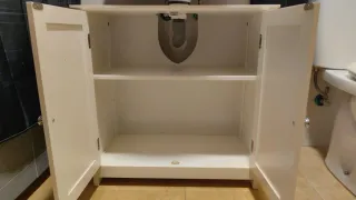 Mueble de madera blanco para lavabo