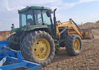Tractor John Deere 7600 con pala Tenias y cazo.
