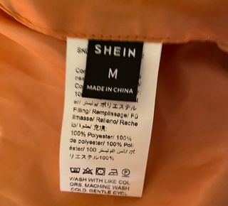 Cazadora americana acolchada con capucha