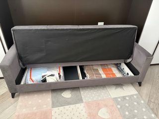 Divano letto grigio in tessuto