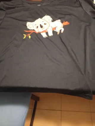 Camiseta morada manga abullonada