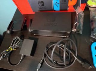 Nintendo Switch + Accesorios (Mando fotos)