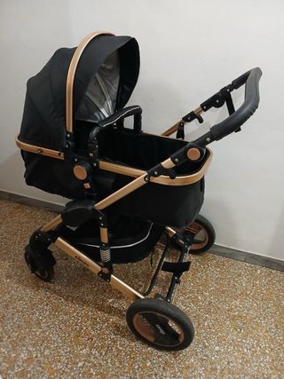 Passeggino nero e oro