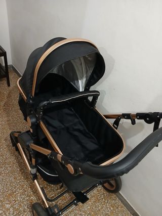 Passeggino nero e oro