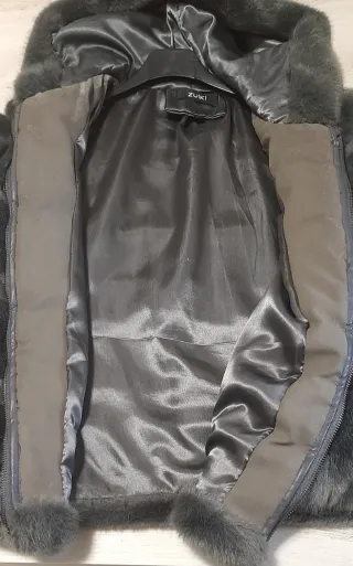 Pellicciotto ecologico grigio con cappuccio