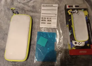 Nintendo Switch Lite Verde+ juegos y fundas