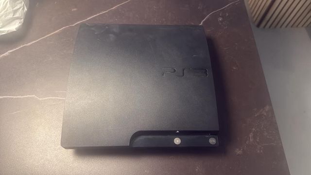 Pack PS3 Slim + Buzzers + Cámara