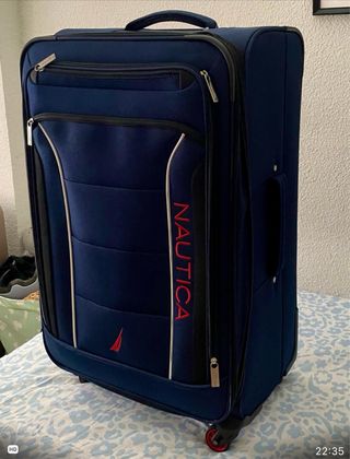 Maleta de viaje verde y marrón