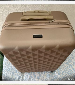 Maleta de viaje verde y marrón