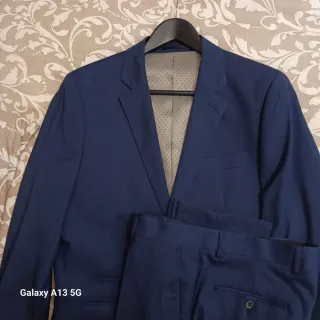 Traje azul hombre