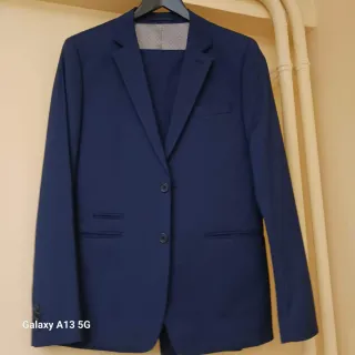 Traje azul hombre