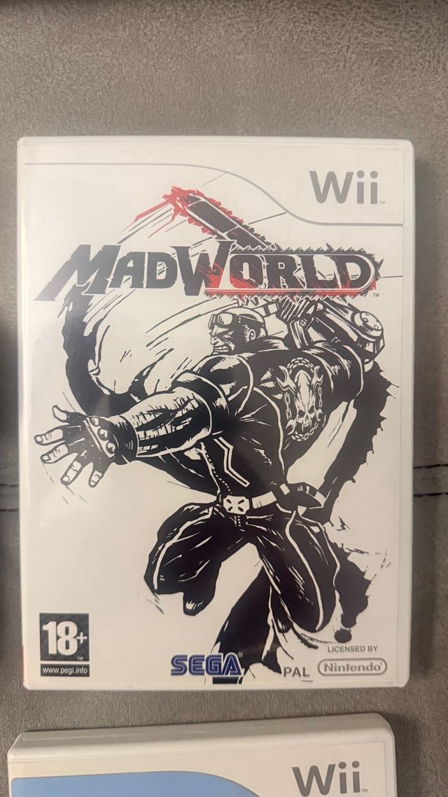 2 Pistolas Wii  + Juegos Madworld y Cocoto