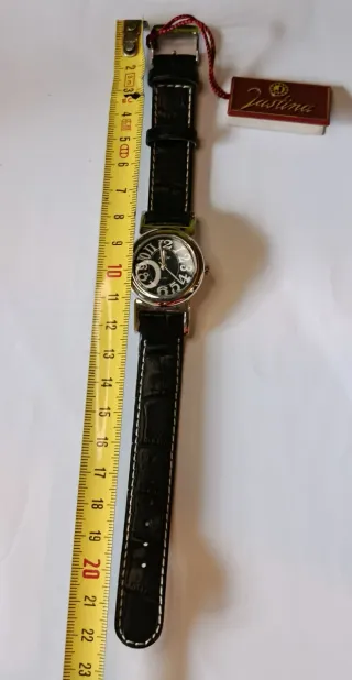 Reloj Justina Clásico Negro y Plateado. Nuevo