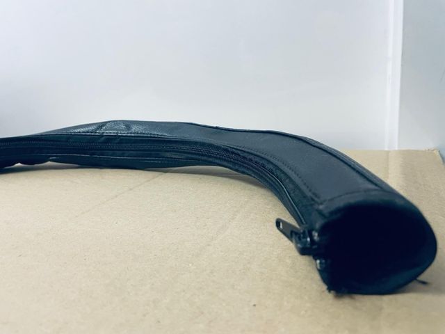 Funda protectora barra cochecito bebé