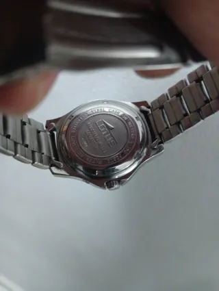 Reloj Lotus Cuarzo multifuncion blanco y plateado