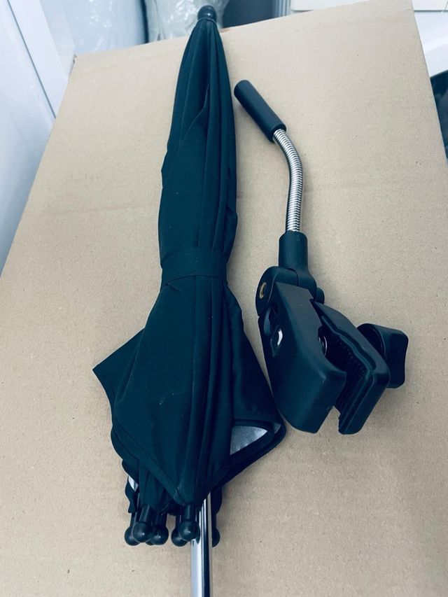 Adaptador y sombrilla para cochecito bebé