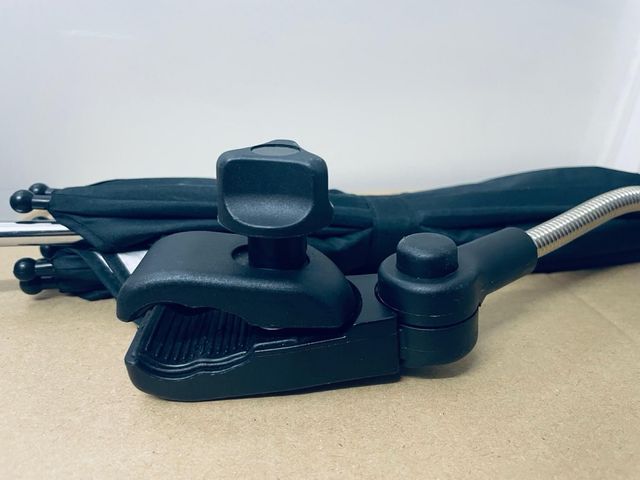 Adaptador y sombrilla para cochecito bebé