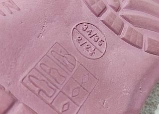 Zuecos rosas y morados