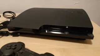 Consola PlayStation 3 + Mando y Cables + 8 juegos