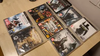 Consola PlayStation 3 + Mando y Cables + 8 juegos