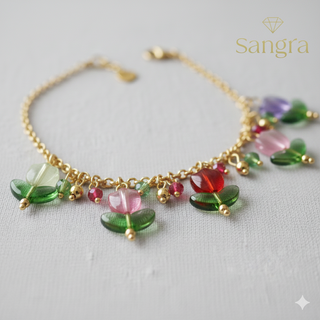Bracciale Sangra dorato con ciondoli fiore