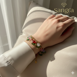 Bracciale Sangra dorato con ciondoli fiore