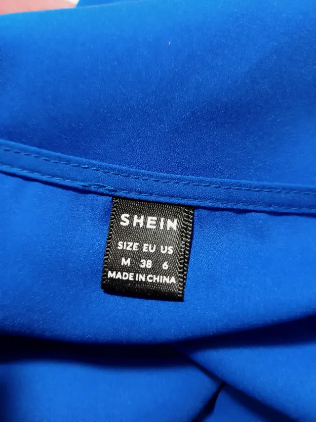 Blusa azul escote pico M