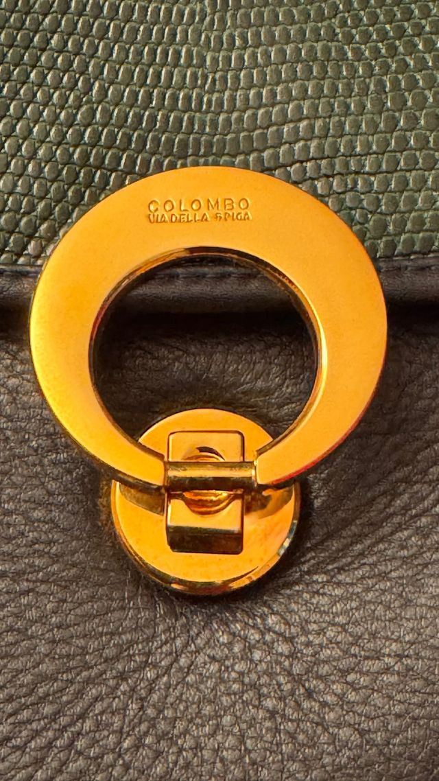 Borsa in pelle e rettile nera e verde