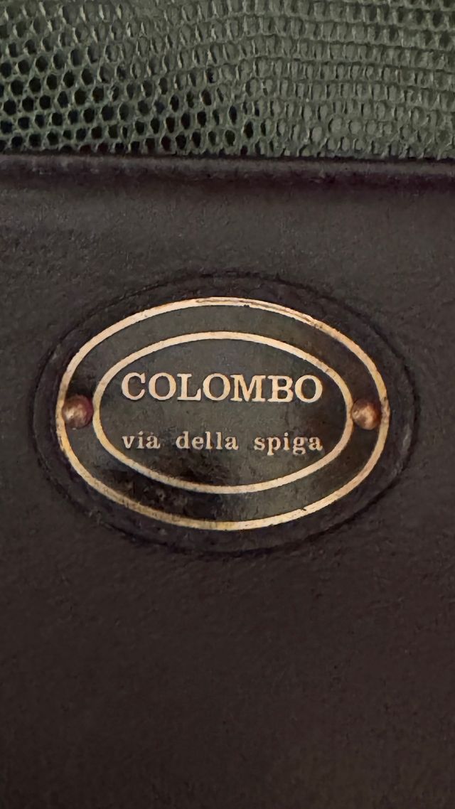 Borsa in pelle e rettile nera e verde